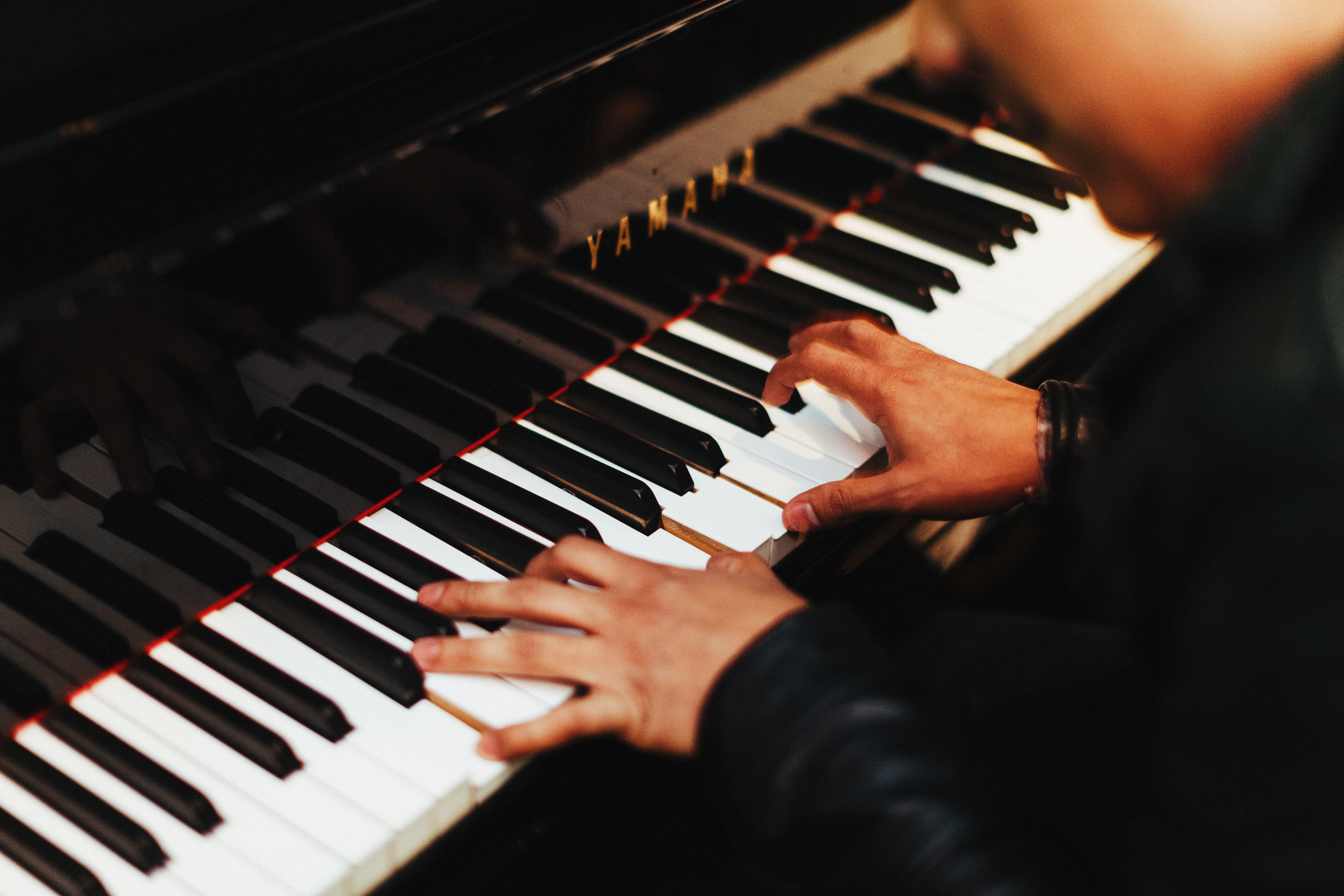 Man playing the piano Man playing the piano